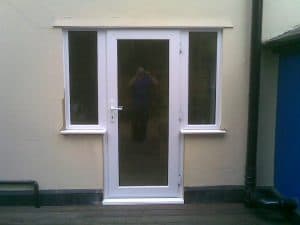 White uPVC door with 2 side windows
