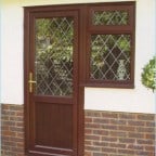 Rosewood uPVC door with leaded bars