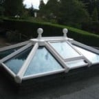 White uPVC lantern rooflight with clear glass and ball finial