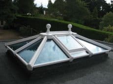 White uPVC lantern roof lights with clear glass and ball finial