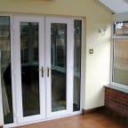White uPVC French Doors with two full length side windows