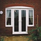 White uPVC French Doors with two side windows