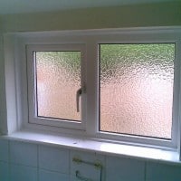 White uPVC window with obscure glass