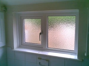 White uPVC window with obscure glass