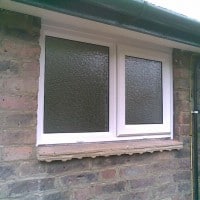 White uPVC window with obscure glass