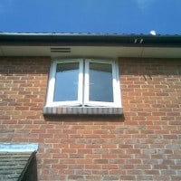 White uPVC window with 4000 trickle vents in each opening casement