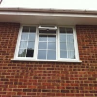 White uPVC window with 18mm white internal Georgian Bars