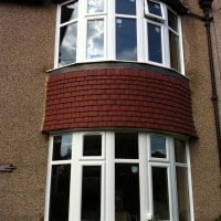 White uPVC bow windows