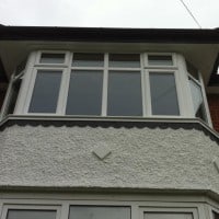 White uPVC bay window with chamfered framing