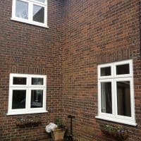 White woodgrain A-rated uPVC window. Liniar fully sculptured framing with dummy casements for equal sight lines