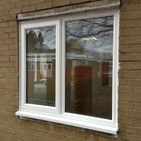 White uPVC window with fully sculptured framing