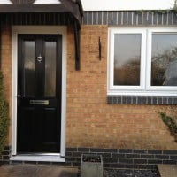 White uPVC window with fully sculptured framing and a dummy casement for equal sight line. 4000 trickle vent in casement.