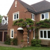 White uPVC window with full sculptured framing and dummy casements for equal sight lines
