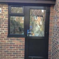 Brown Black A-rated uPVC windows with 9mm diamond leaded lights