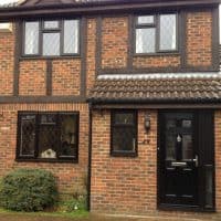 Brown Black A-rated uPVC windows with 9mm diamond leaded lights
