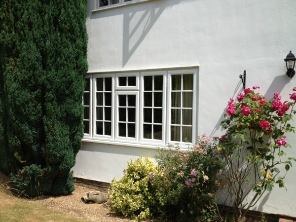 White Liniar uPVC A-rated windows with surface mounted Georgian Bars