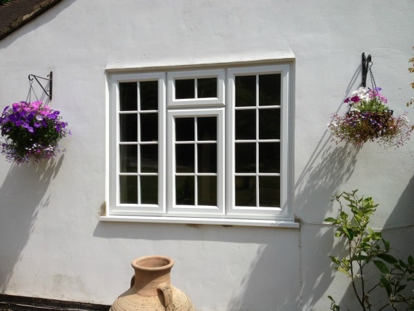 White Liniar uPVC A-rated windows with surface mounted Georgian Bars