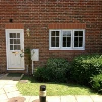 White uPVC windows - Swiftframe profile with bevelled framing and beading and internal Georgian Bars