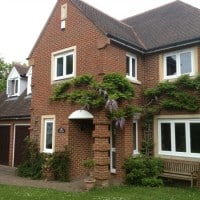 White Liniar A-rated uPVC windows with dummy casements for equal sight lines