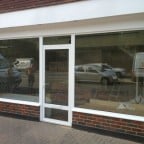 White powder coated aluminium frames which were double glazed with clear laminated glass for security.