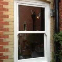 uPVC vertical sliding windows with decorative horns