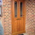 Nottingham style Golden Oak composite door