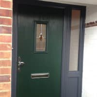 anthracite-grey-outerframe-with-green-front-door-in-brockham-by-dorking-glass