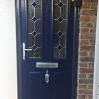 blue-composite-door-with-anthracite-grey-outerframe-installed-in-beare-green-by-dorking-glass