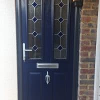 blue-composite-door-with-anthracite-grey-outerframe-installed-in-beare-green-by-dorking-glass