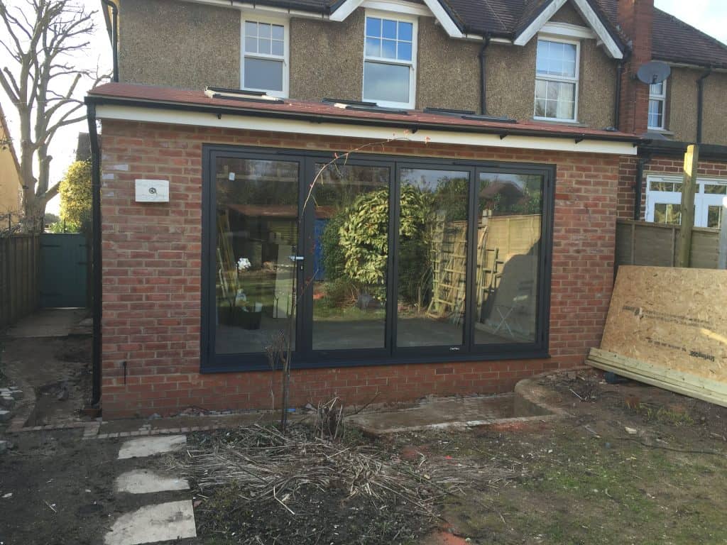 double-glazed-anthracite-grey-aluminium-bifolding-doors-by-dorking-glass