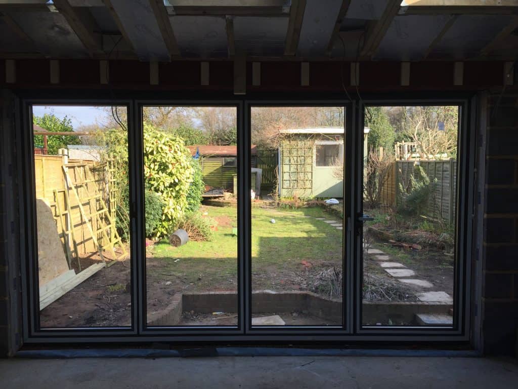 double-glazed-anthracite-grey-aluminium-bifolding-doors-by-dorking-glass-2