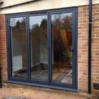 double-glazed-anthracite-grey-aluminium-bifolding-doors-by-dorking-glass-3