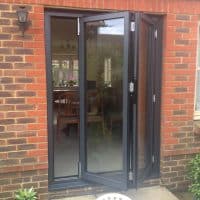 double-glazing-anthracite-grey-aluminium-bifolding-doors-in-brockham-dorking-glass