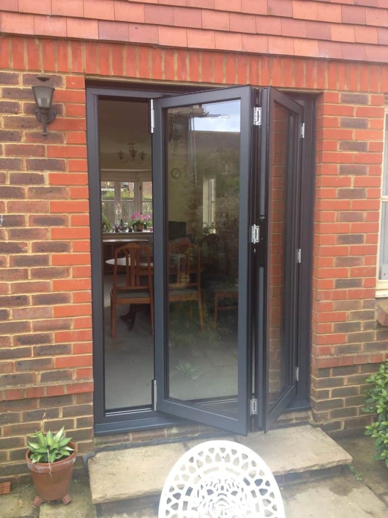 double-glazing-anthracite-grey-aluminium-bifolding-doors-in-brockham-dorking-glass