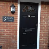 double-glazing-black-composite-front-door-in-dorking-glass